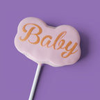 Fourth Cake Pops with baby girl shower themed text "Baby".