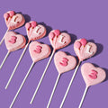 Pink Cake Pops with Letter L, two pink Balloons and Pink Number 3.