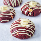 Red velvet cookies with cream cheese filling and white chocolate