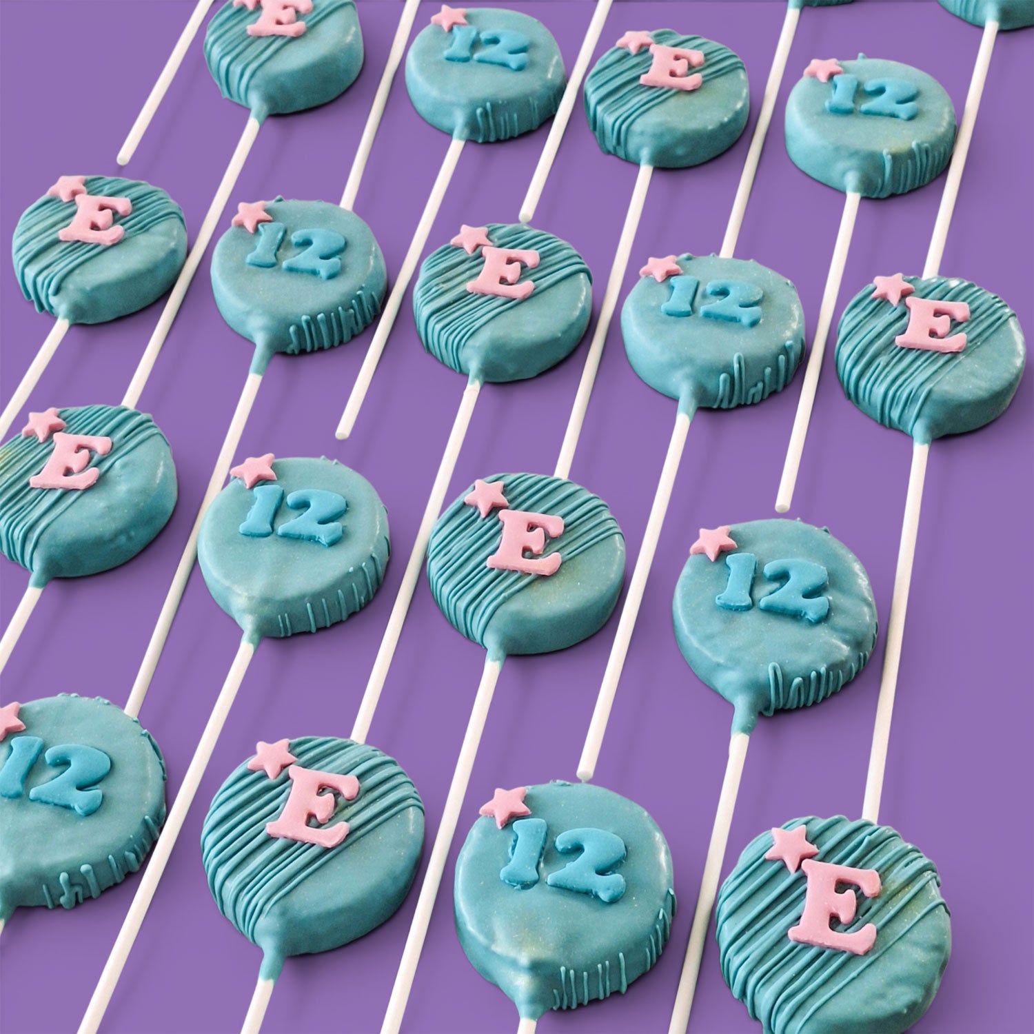 Teal Rounded shape Cake Pops with 'E' and '12' decorations.